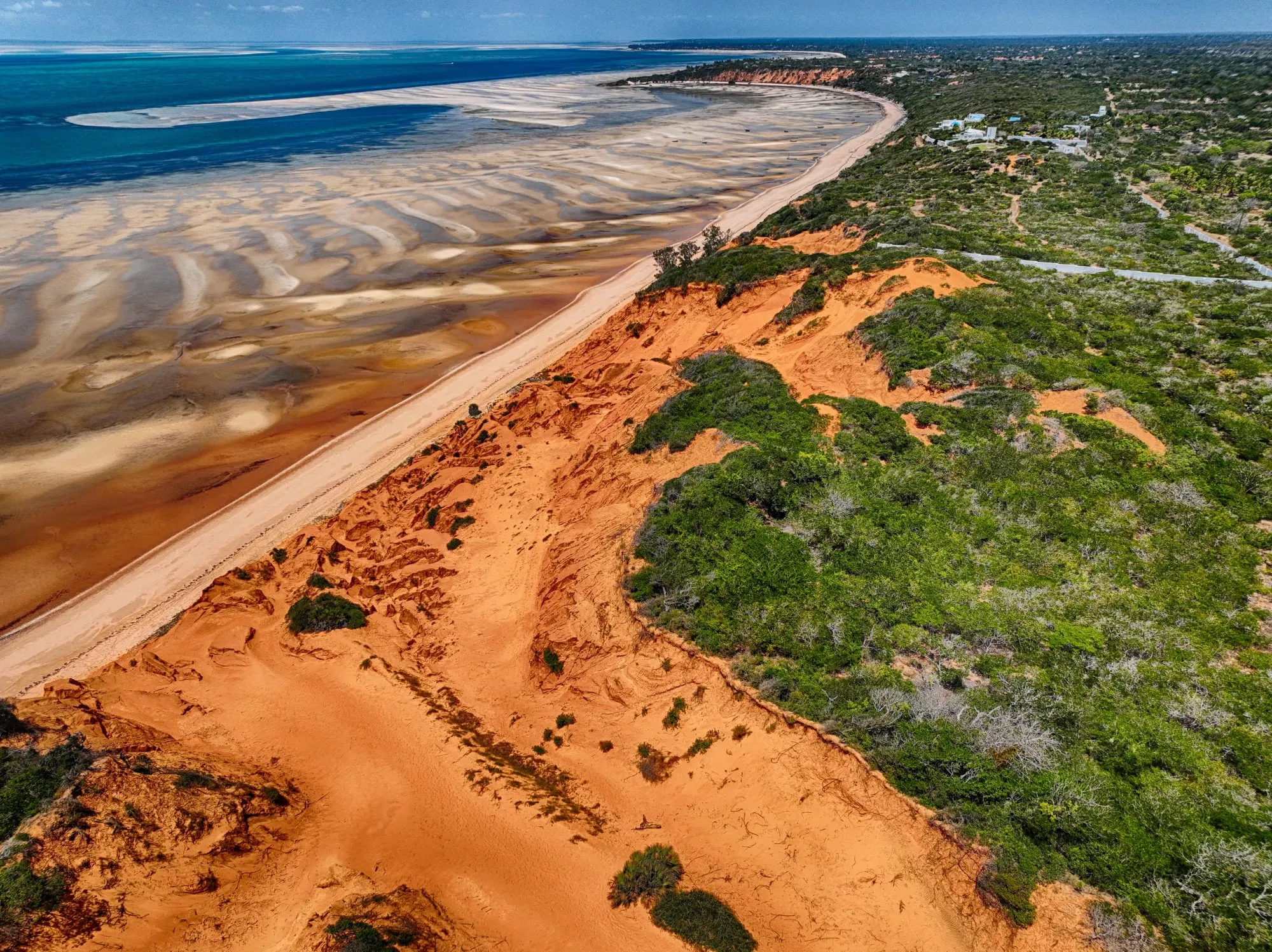 Red dunes meeting the Indian Ocean near Vilanculos