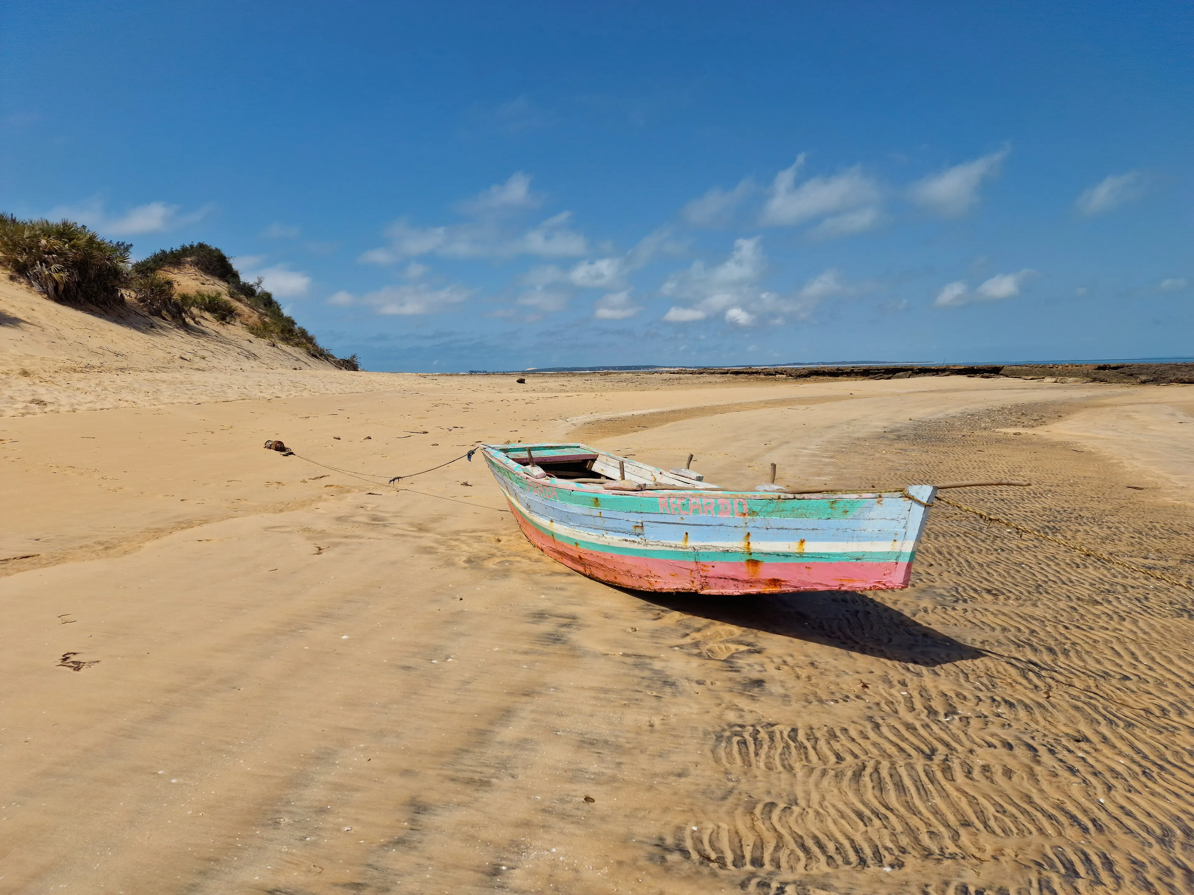 A traditional dhow on the shore of Bazaruto Island